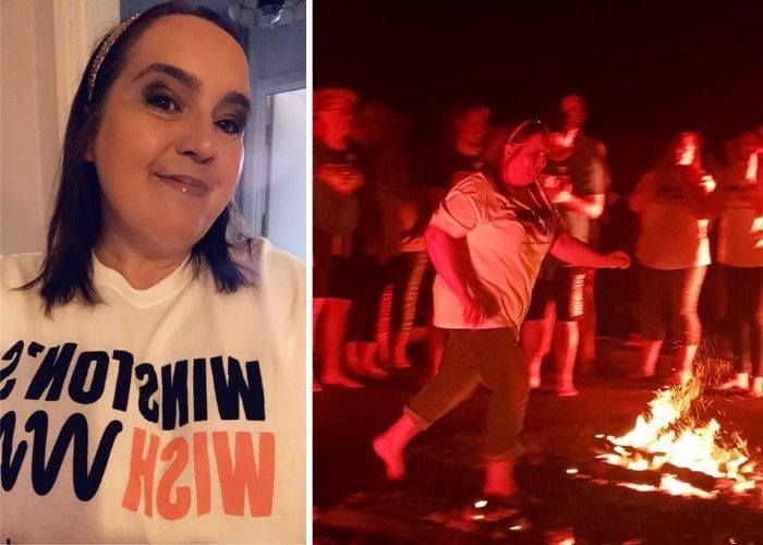 Kate wearing a Winston's Wish t-shirt and completing her firewalk