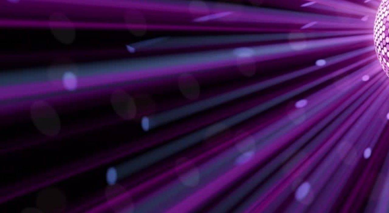 purple glitter disco ball with light shafts