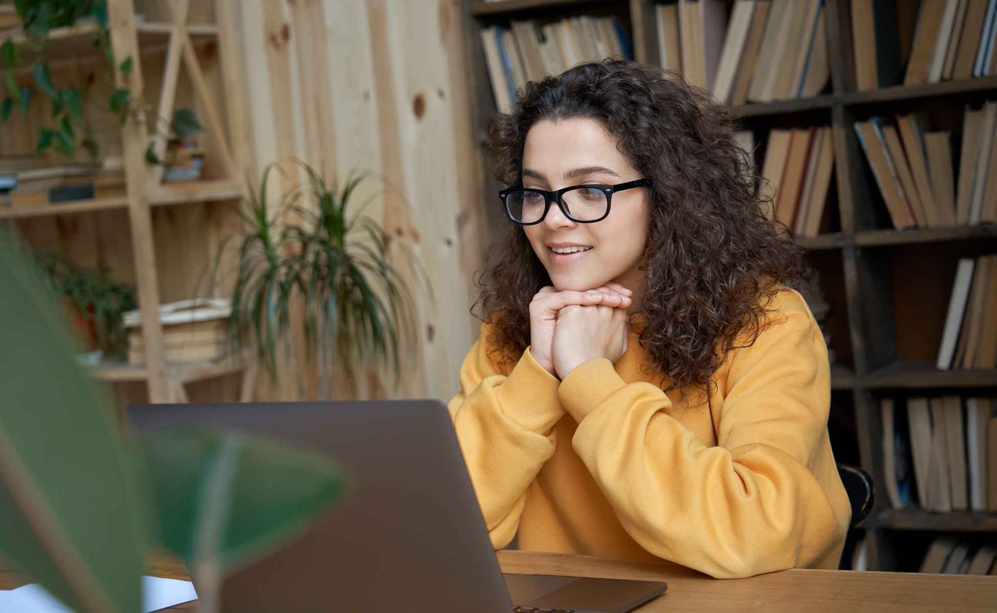 Young woman looking at a laptop